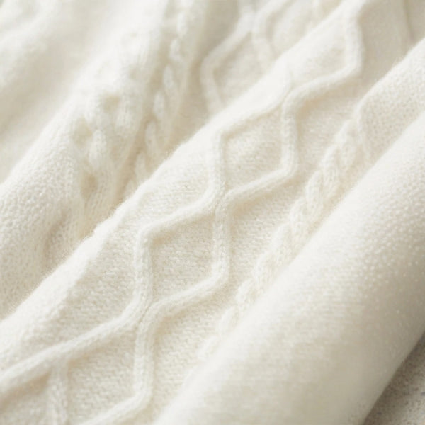 The Cortina Merino Wool Cable Turtleneck